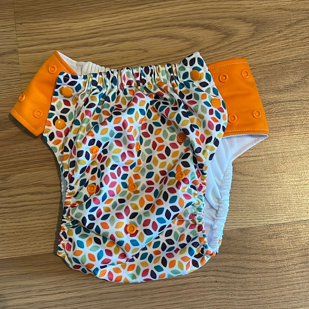 Adjustable reusable swim diaper